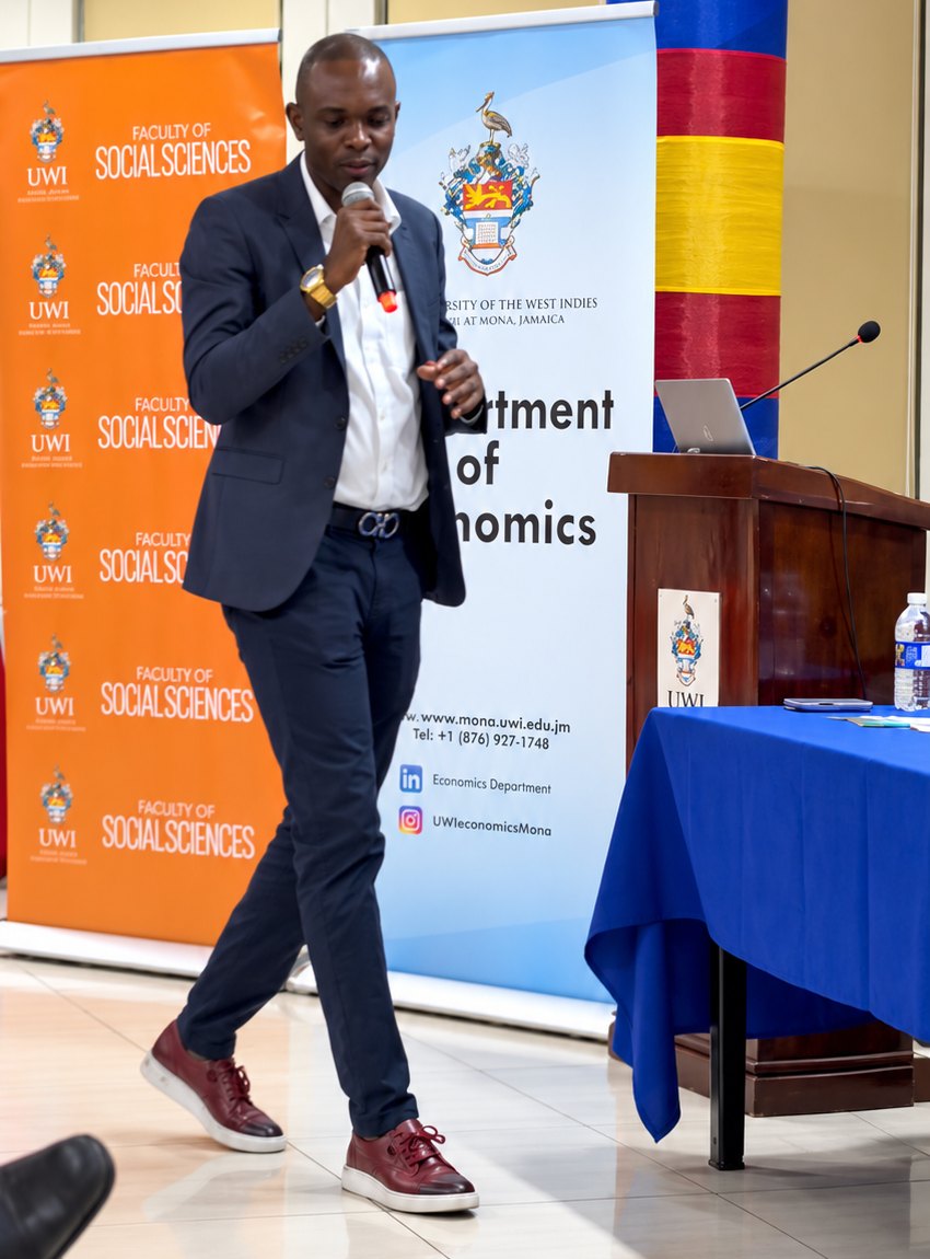 Professor Haughton speaking at a UWI Department of Economics event